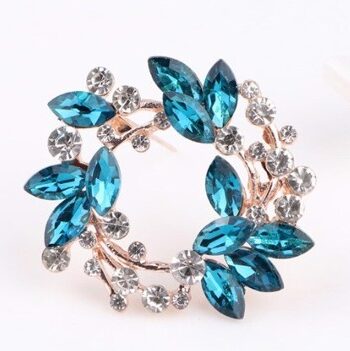 Broche Guld Cirkel Med Blade Sten Teal